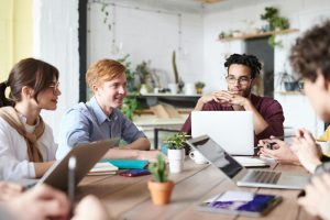 4-5 colleagues having a team meeting